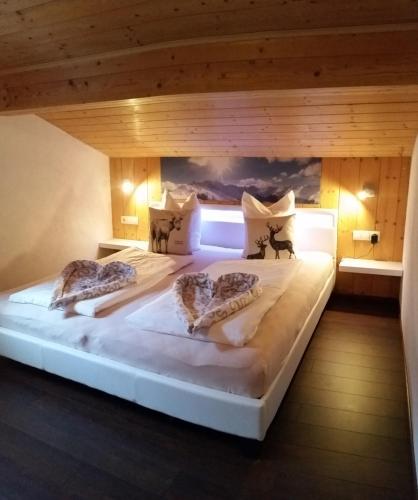 Posteľ alebo postele v izbe v ubytovaní Ferienwohnung Andrea