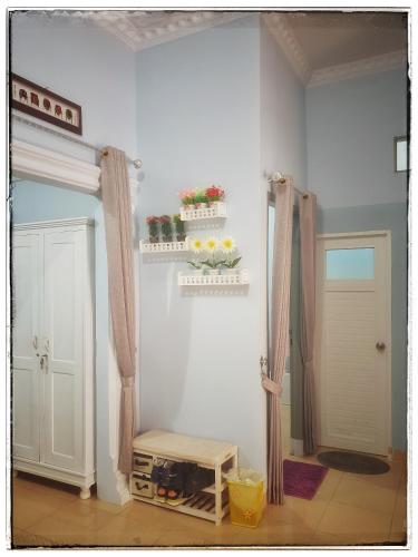 Фотография из галереи Rumah Ayin Homestay Near Airport в городе Палембанг