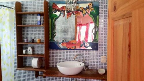 Kylpyhuone majoituspaikassa AmimodoBeachRooms