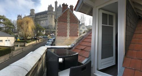 a view of a building from a window of a house at Villa Napoléon in Pierrefonds