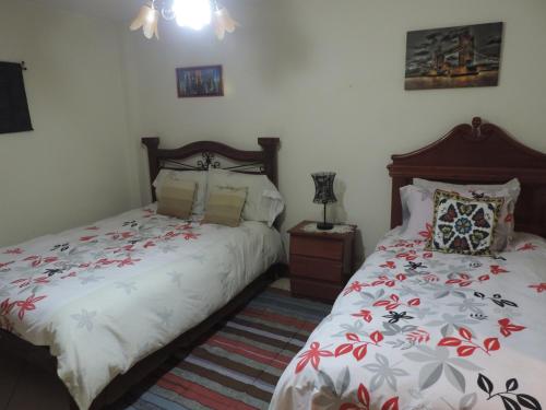 A bed or beds in a room at Departamento Para Turistas