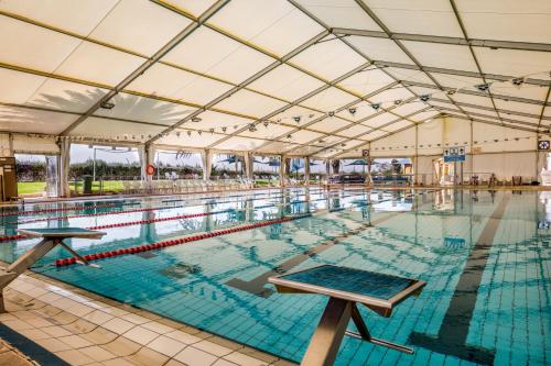 The swimming pool at or close to Mashabei Sade Kibbutz Country Lodging