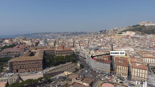 an aerial view of a city with a street sign at B&B Musica e Mare in Naples