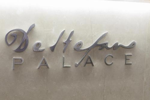 a sign on the side of a building at De Stefano Palace Luxury Hotel in Ragusa