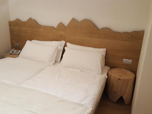 Postel nebo postele na pokoji v ubytování Residence Langes
