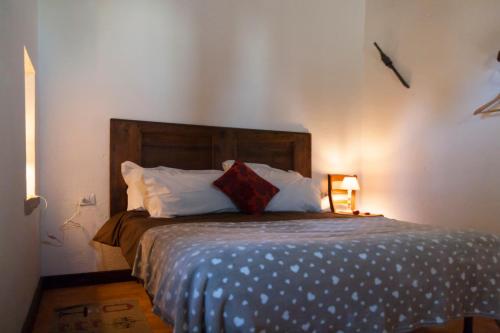 Una cama o camas en una habitación de Le Terre di Caprano