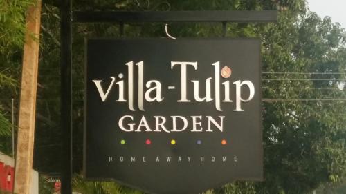 a sign that reads villa lift garden at Villa Tulip Garden in Anuradhapura