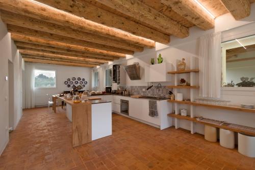 Agriturismo Relais Maddalene101 tesisinde mutfak veya mini mutfak