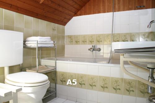 Kylpyhuone majoituspaikassa Seeappartements Excelsior