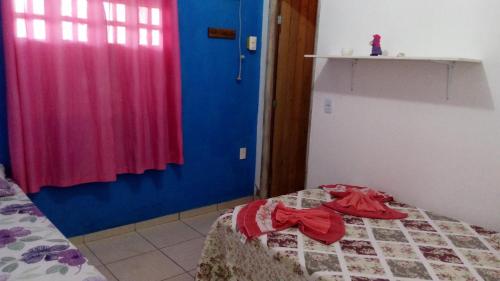 Ein Bett oder Betten in einem Zimmer der Unterkunft Pousada Sol da Ilha