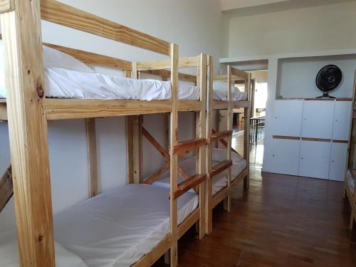 Postel nebo postele na pokoji v ubytování Hostel Orla de Tambaú