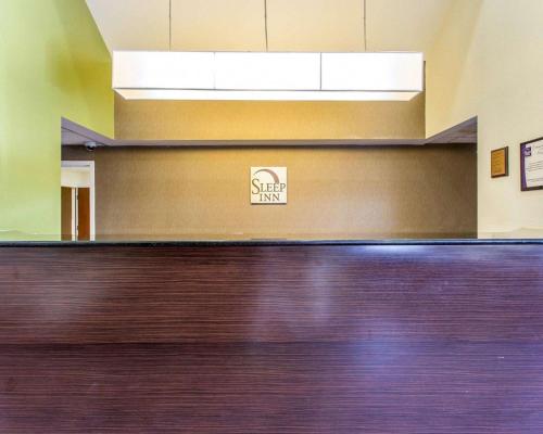 a waiting room with a sign that says star inn at Sleep Inn Columbia in Columbia