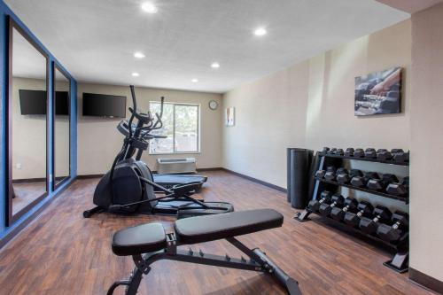 a room with a gym with a treadmill and weights at Comfort Inn & Suites Pinetop Show Low in Pinetop-Lakeside