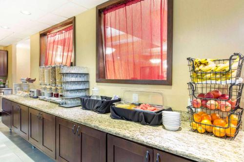 a kitchen with a counter with fruit on it at The Oaks Hotel & Suites in Paso Robles