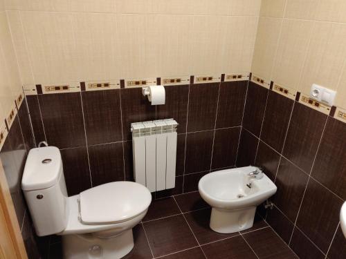 Ένα μπάνιο στο Apartamentos Mirador de Grañón