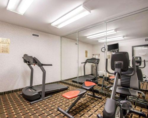 a gym with several tread machines in a room at Quality Inn Edmund Pettus Bridge area in Selma