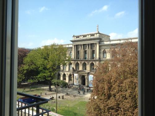 a view of a building from a window at Garden Living - Boutique Hotel in Berlin