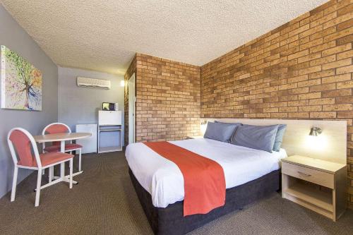 Ένα ή περισσότερα κρεβάτια σε δωμάτιο στο Comfort Inn Dubbo City