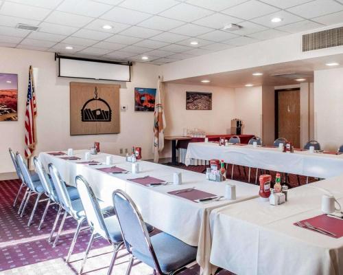 a conference room with white tables and chairs at Navajo Nation Inn in Window Rock