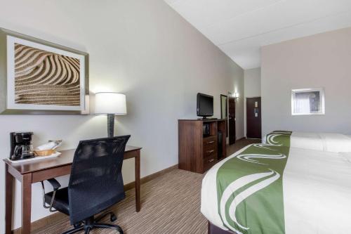 Ένα ή περισσότερα κρεβάτια σε δωμάτιο στο Quality Inn & Suites Mountain Home North