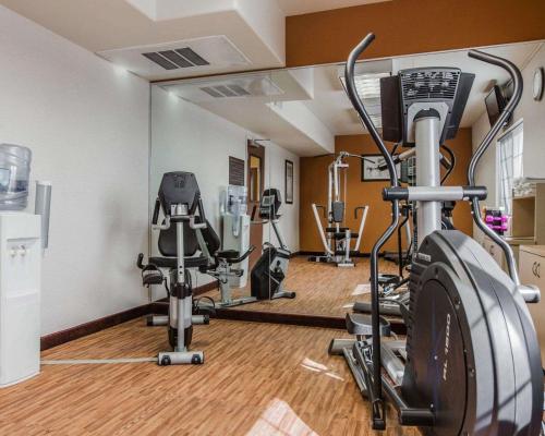 a fitness room with several treadmills and machines at Quality Inn Rosemead-Los Angeles in Rosemead