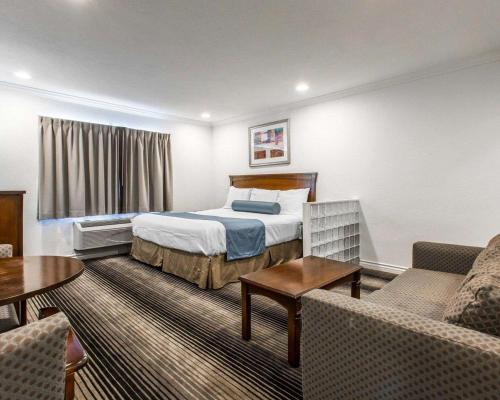 En eller flere senger på et rom på Hotel Dreamscape Pacific Coast Highway