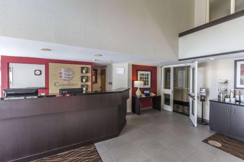 a lobby of a hospital with a reception desk at Comfort Inn Corner Brook in Corner Brook