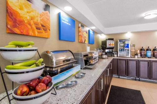 a kitchen filled with lots of different types of food at Comfort Inn Airport in North Bay