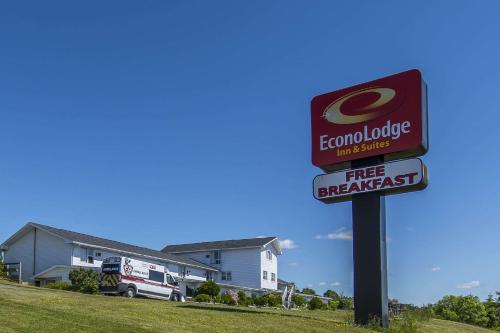 a free breakfast sign in front of a fire truck at Econo Lodge Inn & Suites in Saint John