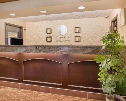 a reception desk in a hospital lobby at Comfort Inn & Suites University in Calgary