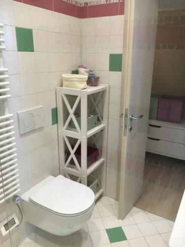 a bathroom with a toilet and a shower at BougainvilleaP in Monterosso al Mare