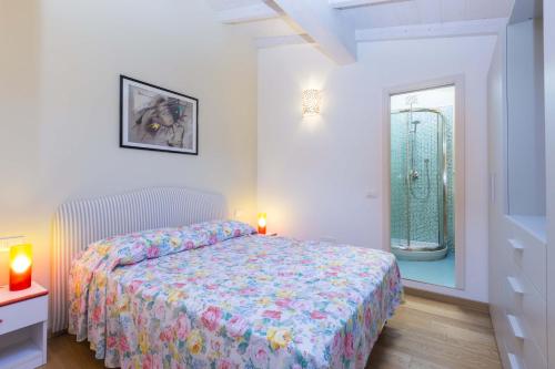 A bed or beds in a room at Appartamenti Lungomare Seafront - Goelba
