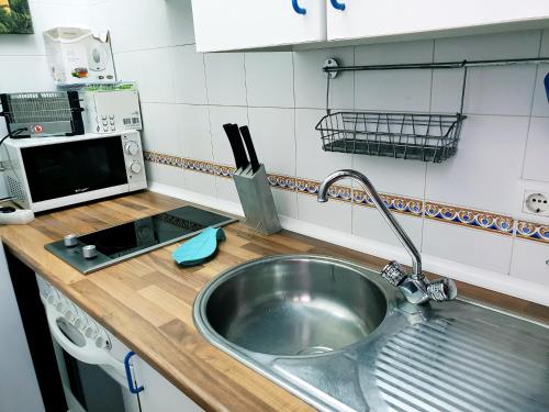 Kuchyň nebo kuchyňský kout v ubytování Apartamento La Rana