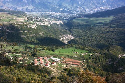 an aerial view of a village in the mountains at Apaga Resort in Ijevan