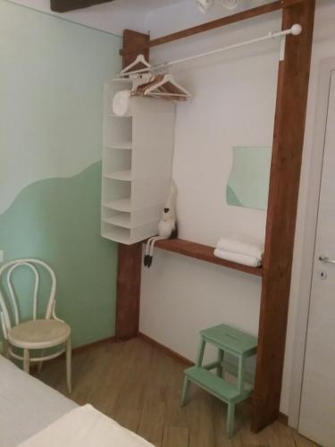 Letto o letti in una camera di La Gioia