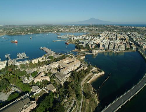 an aerial view of a city and a body of water at Guest House San Domenico in Augusta