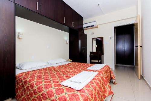 Кровать или кровати в номере Kama Lifestyle Apartments