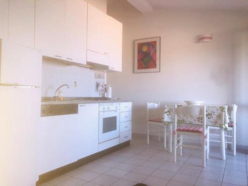 Kuchyň nebo kuchyňský kout v ubytování Torre dei Corsari mit Aussicht auf Meer und Dune