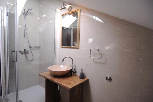 Ένα μπάνιο στο Apartments Jasmina