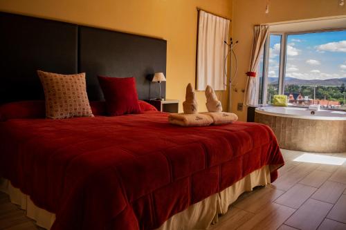 Ένα ή περισσότερα κρεβάτια σε δωμάτιο στο Posada y spa Las Golondrinas