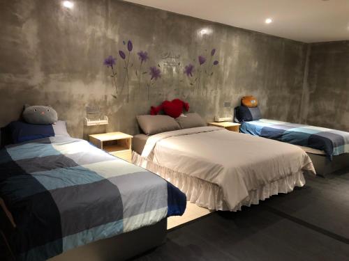 Postel nebo postele na pokoji v ubytování Ipoh Zing Vale - Family & Couple Suite