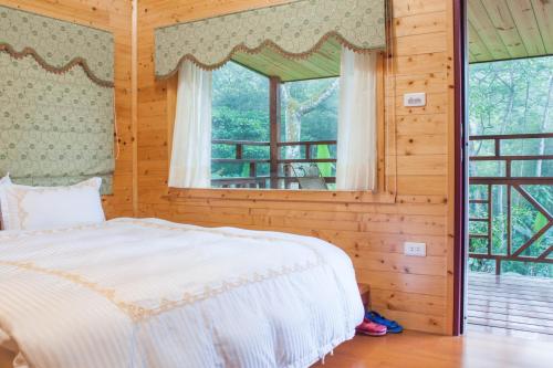 Postel nebo postele na pokoji v ubytování Xitou Star Homestay