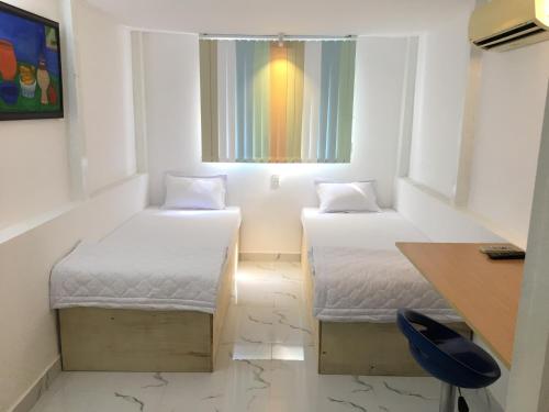 เตียงในห้องที่ Baoanh Hostel