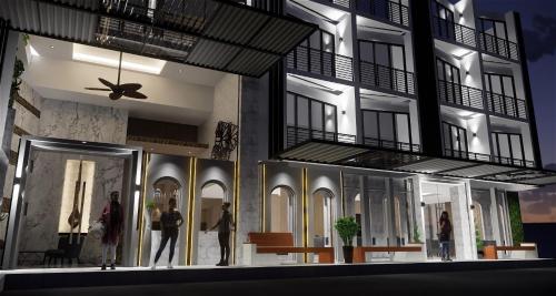 a rendering of a building with people standing outside of it at Phoenix Hotel Karon Beach in Karon Beach