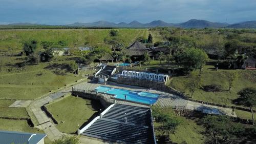 an aerial view of a resort with a swimming pool at African Rest Lodge in Barberton