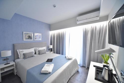 My Charm Lisbon Suitesにあるベッド