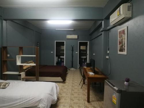 Postel nebo postele na pokoji v ubytování E2S Place