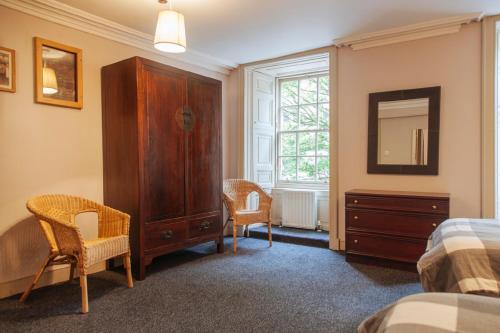 Säng eller sängar i ett rum på Dundee Backpackers Hostel