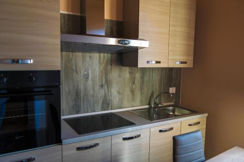 Kuchyň nebo kuchyňský kout v ubytování Badiula Flat
