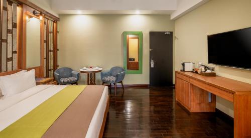 Μια τηλεόραση ή/και κέντρο ψυχαγωγίας στο Treasures Hotel and Suites